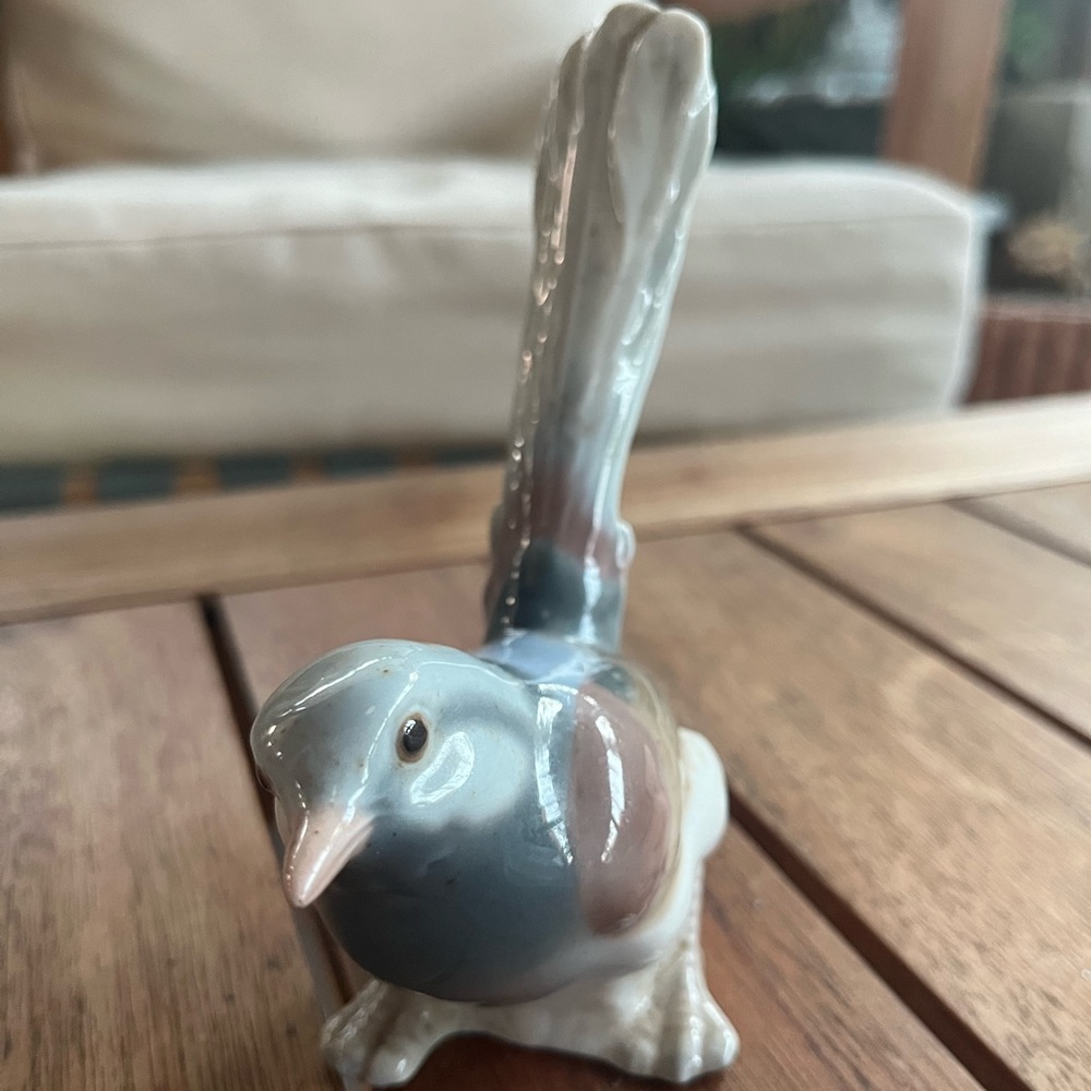 Lladro long tail bird figurine